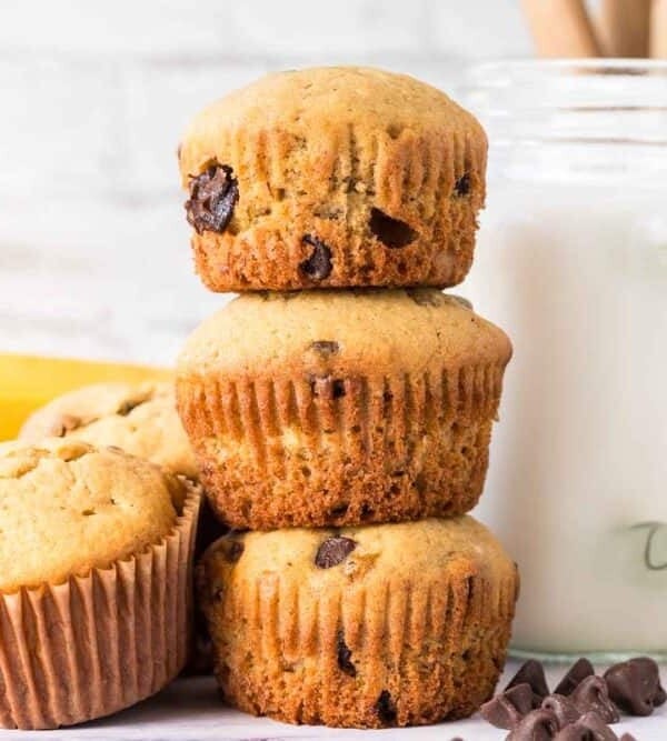 small stack of three banana chocolate chip muffins