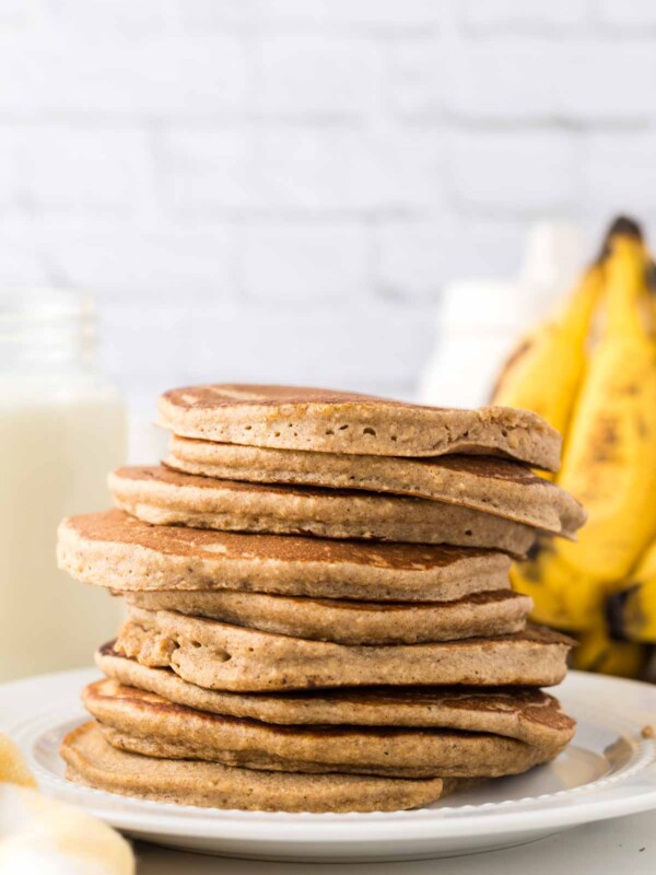 side view of a stack of banana oatmeal pancakes