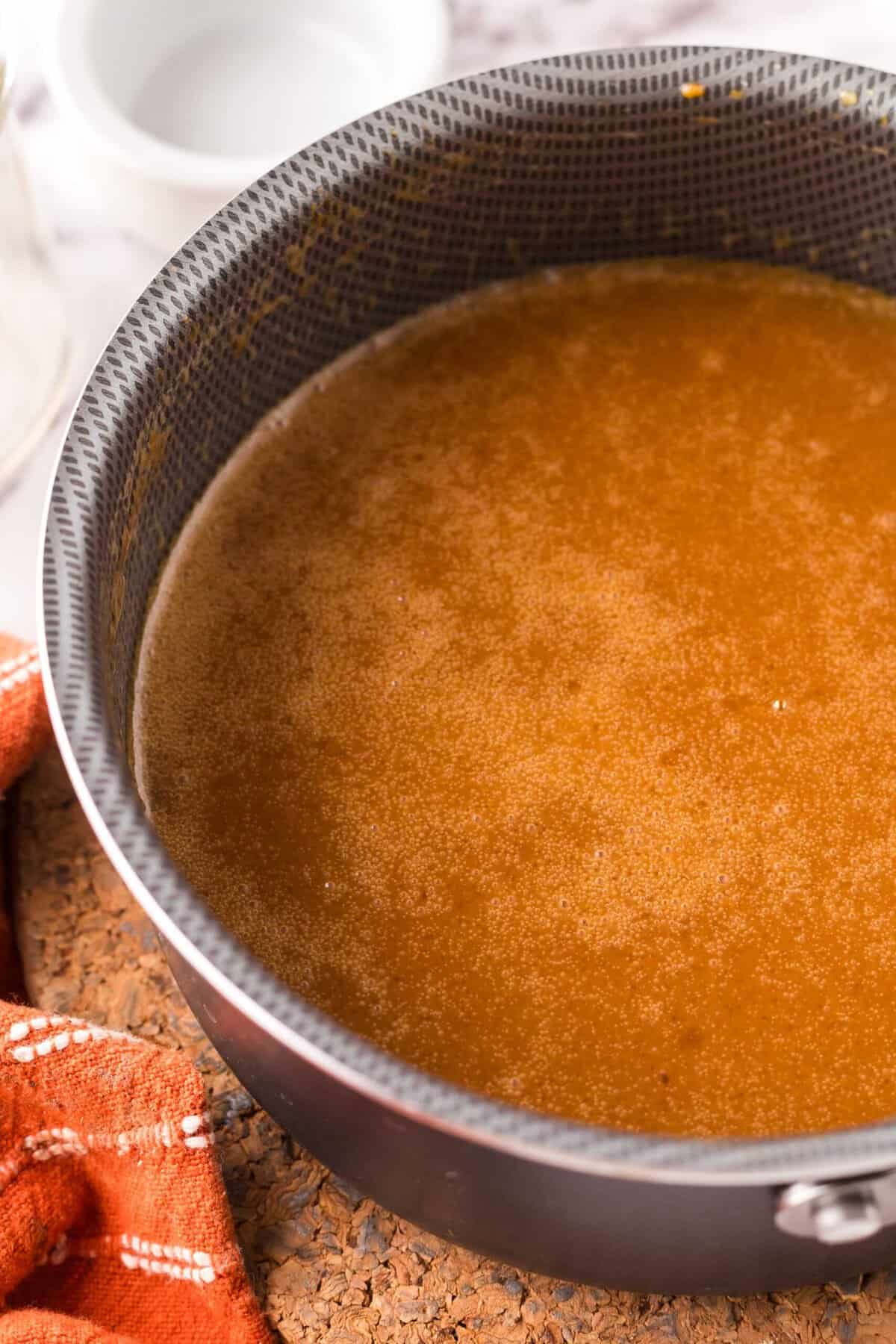 sauce pan with ingredients to make homemade caramel sauce.