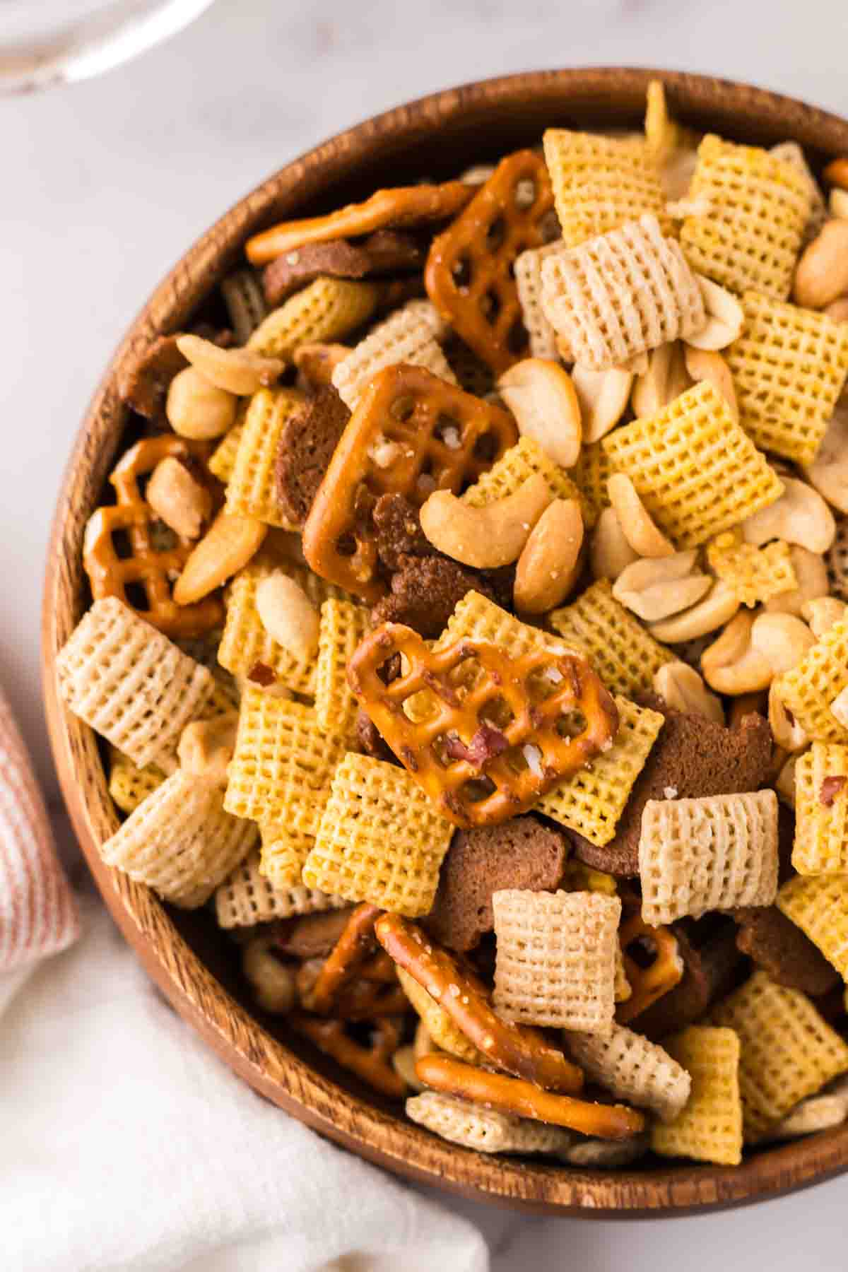 chex mix recipe in a wooden bowl.