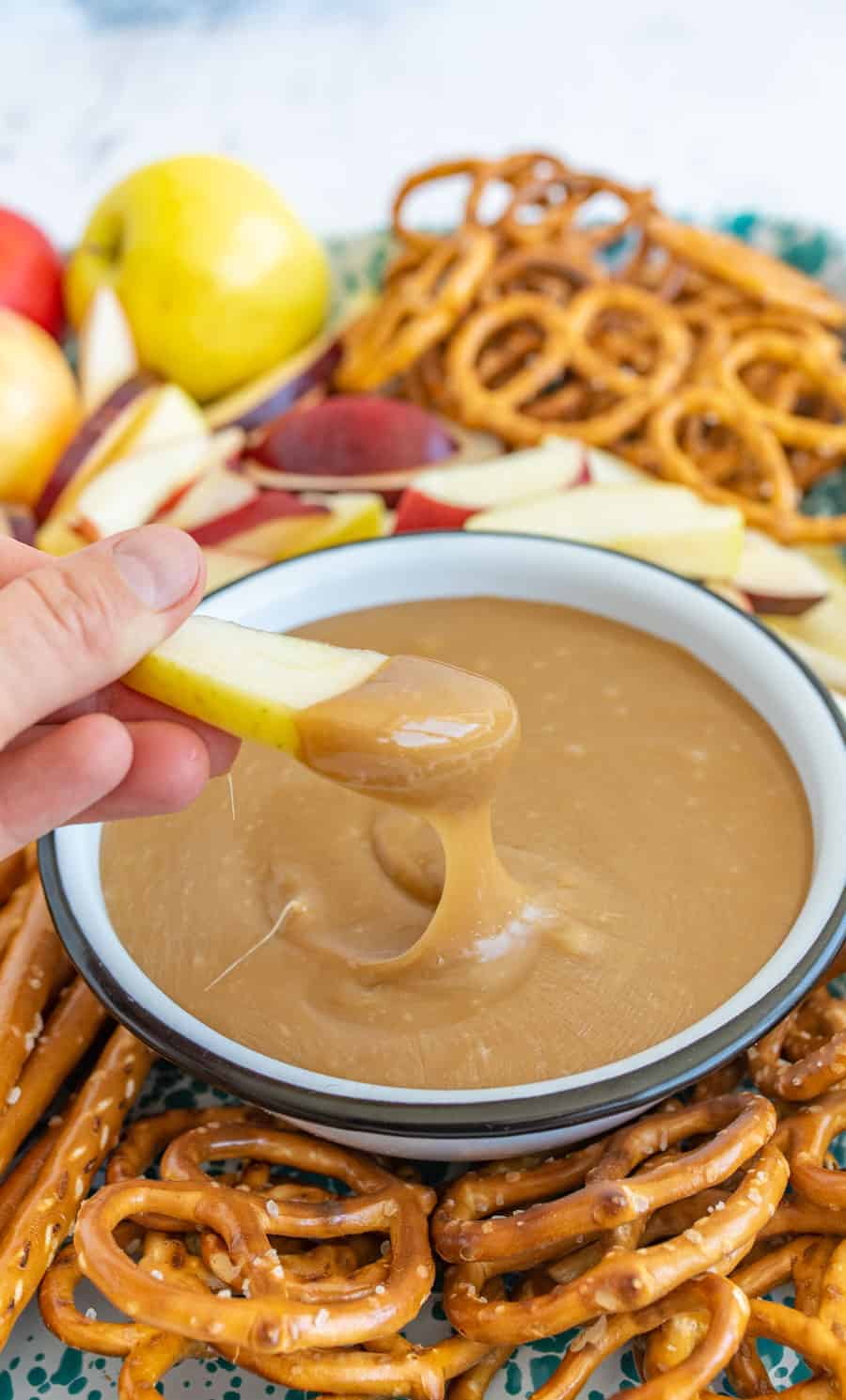 apples and pretzels dipped in homemade caramel dip.