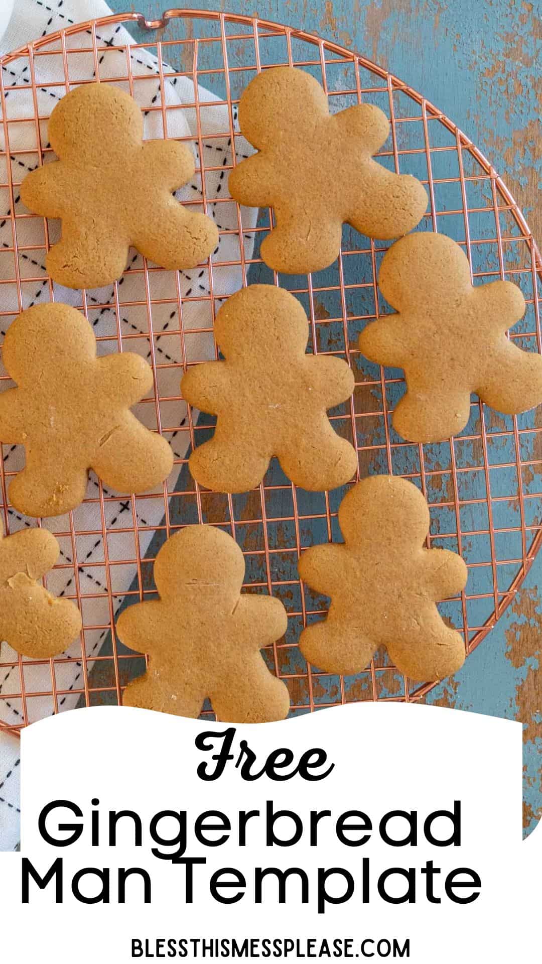 A wire rack holds several gingerbread man cookies on a patterned cloth. The text at the bottom reads, Free Gingerbread Man Cookie Templates and blessthismessplease.com.