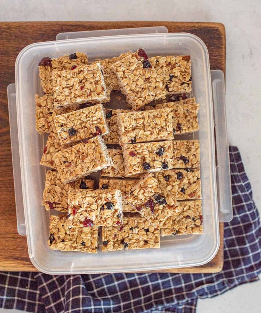 top view of granola bars in a plastic container.