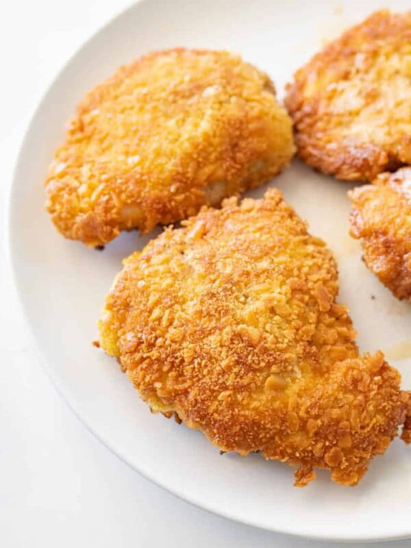 close up parmesan crusted chicken on a plate