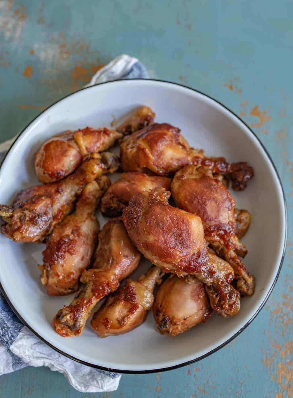 cooked chicken legs in a plate