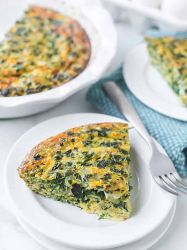 crustless spinach quiche on a white plate