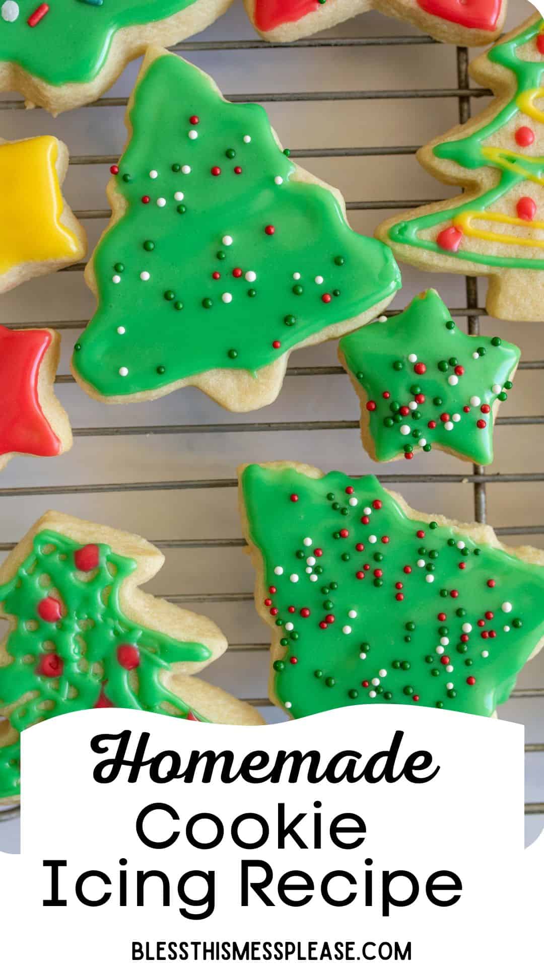 A variety of Christmas tree and star-shaped sugar cookies with green, red, and yellow icing on a cooling rack. Text at the bottom reads Homemade Cookie Icing Recipe with a website watermark.